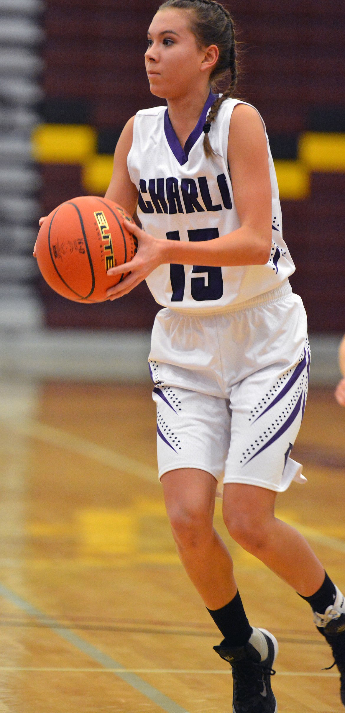 CHARLO HIGH School guard Destiny Manuel surveys the court and tries to find an open player in the first half of the Lady Vikings game against Clark Fork-Superior Friday morning at the Class-C Ronan-SKC Tip-Off Tournament. (Jason Blasco/Lake County Leader)