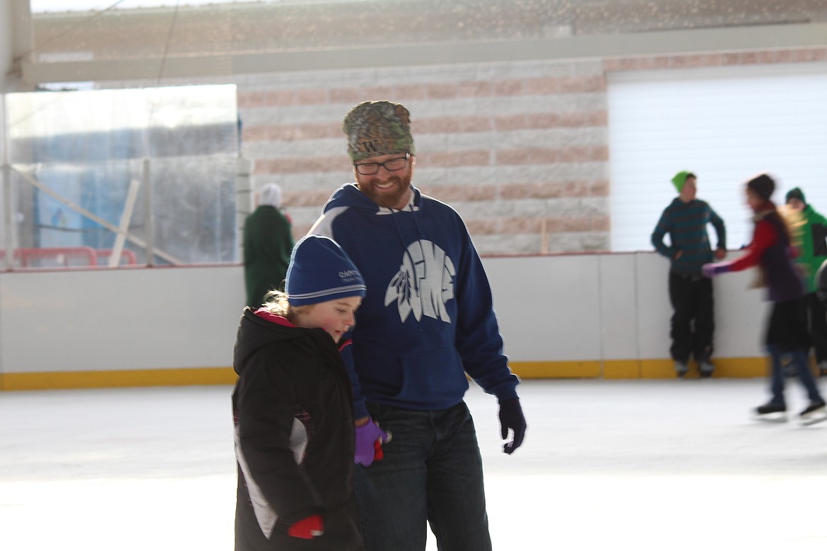 Cheryl Schweizer/Columbia Basin HeraldSkaters take to the ice at the Larson Ice Rink Monday. The rink is one option for families looking for something to do during the winter break.