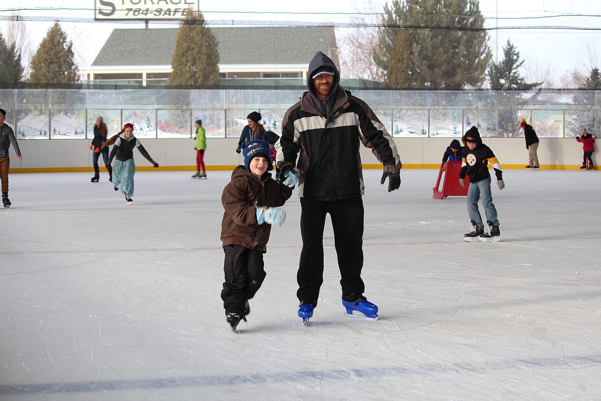 Cheryl Schweizer/Columbia Basin HeraldSkaters skimmed - at varying speeds -around Larson Ice Rink Monday afternoon. The ice rink is one option for families looking for activities during the break from school.