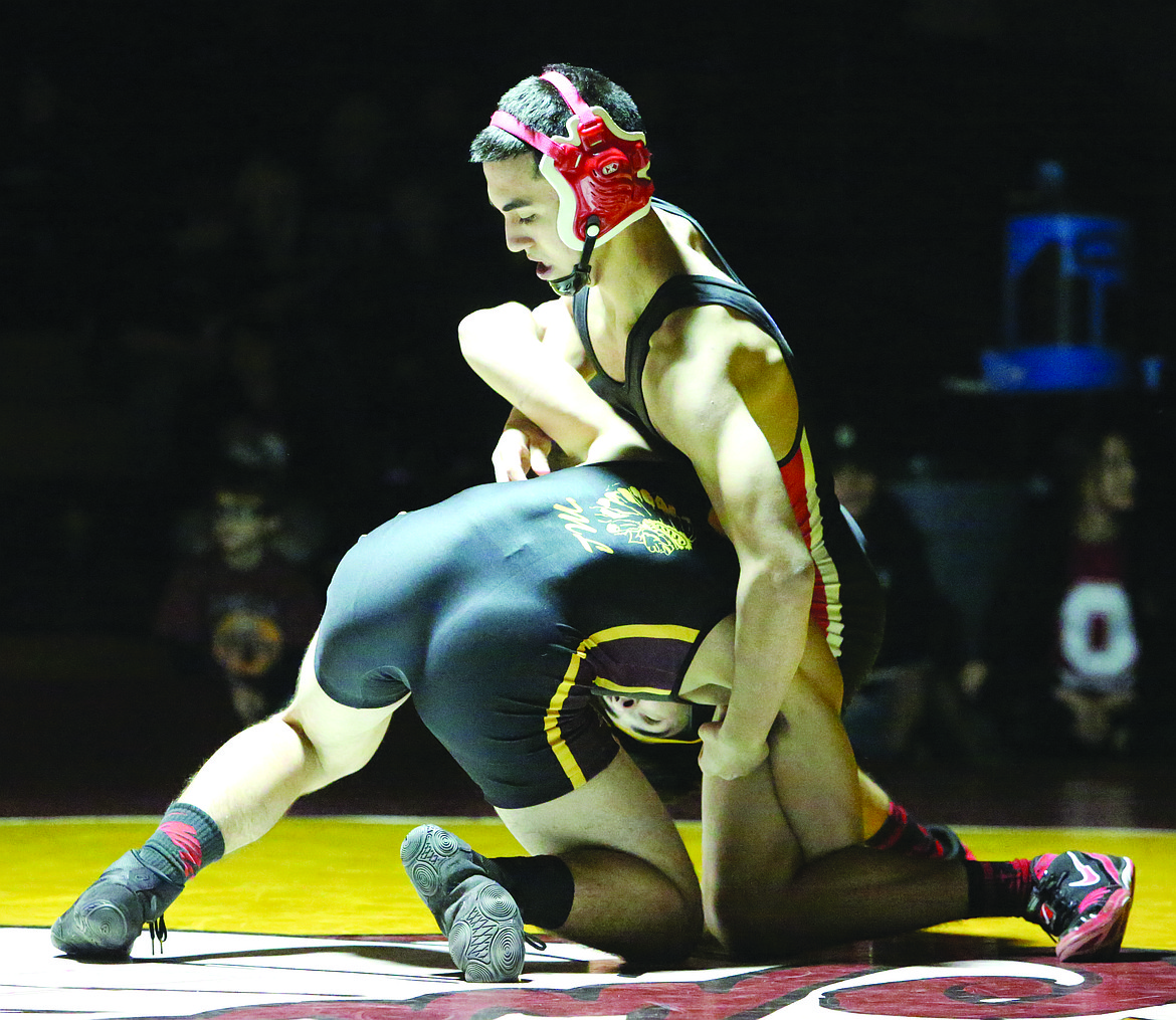 Connor Vanderweyst/Columbia Basin Herald
Othello's Ben Garza tries to fight off a shot from Nick Hara.