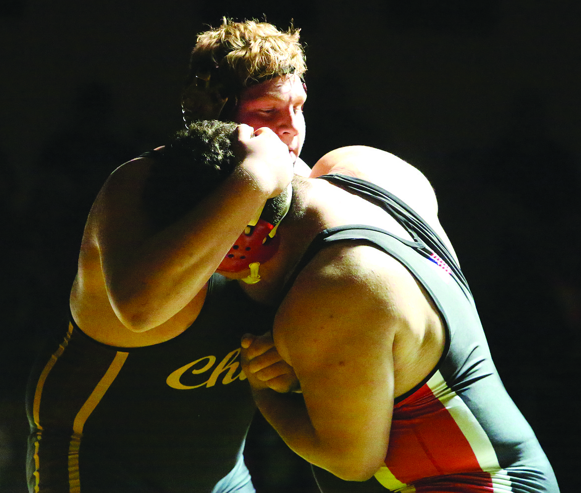 Connor Vanderweyst/Columbia Basin Herald
Moses Lake's Chandler Fluaitt grapples with Othello's Chemi Cantu.