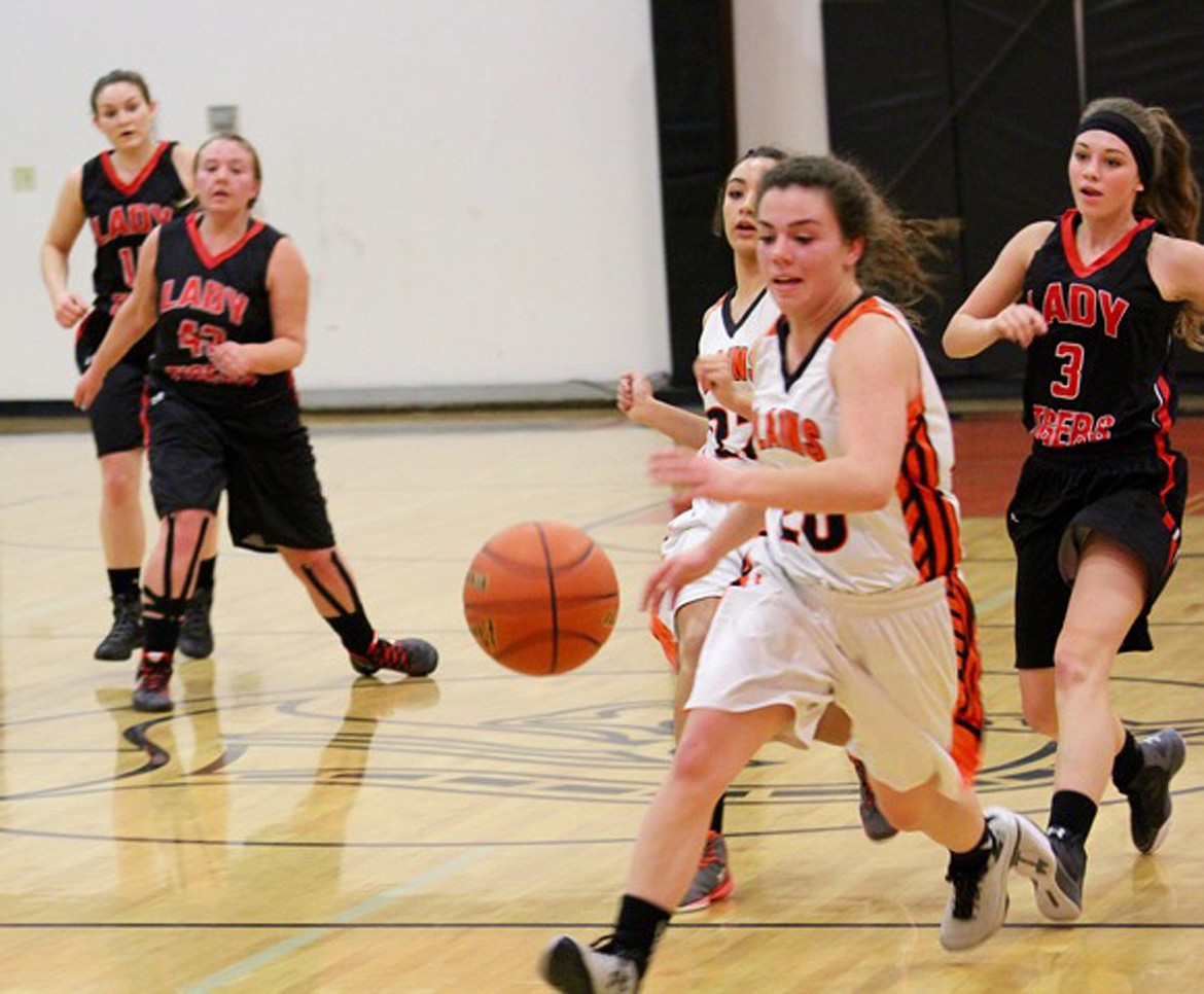 HALEY JOSEPHSON, of Plains, drives to the basket as the Darby defense races to catch up on Thursday. (Douglas Wilks photos/Clark Fork Valley Press)