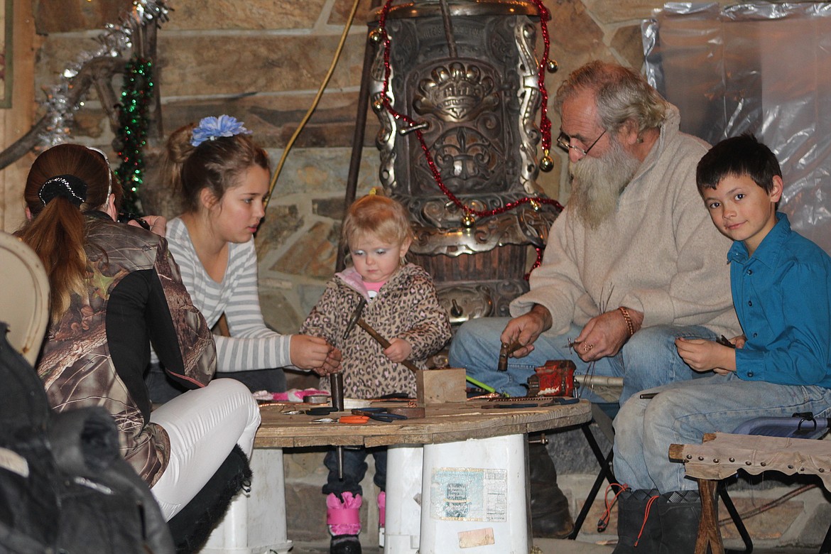 Local artisan Weezil came out to the Christmas party at the Stateline on Sunday, Dec. 18. He brought some jewelry-making materials along with him and hosted a workshop in order to teach children how easy it can be to make Christmas presents with their own two hands.









&#151;Photo by STAR SILVA