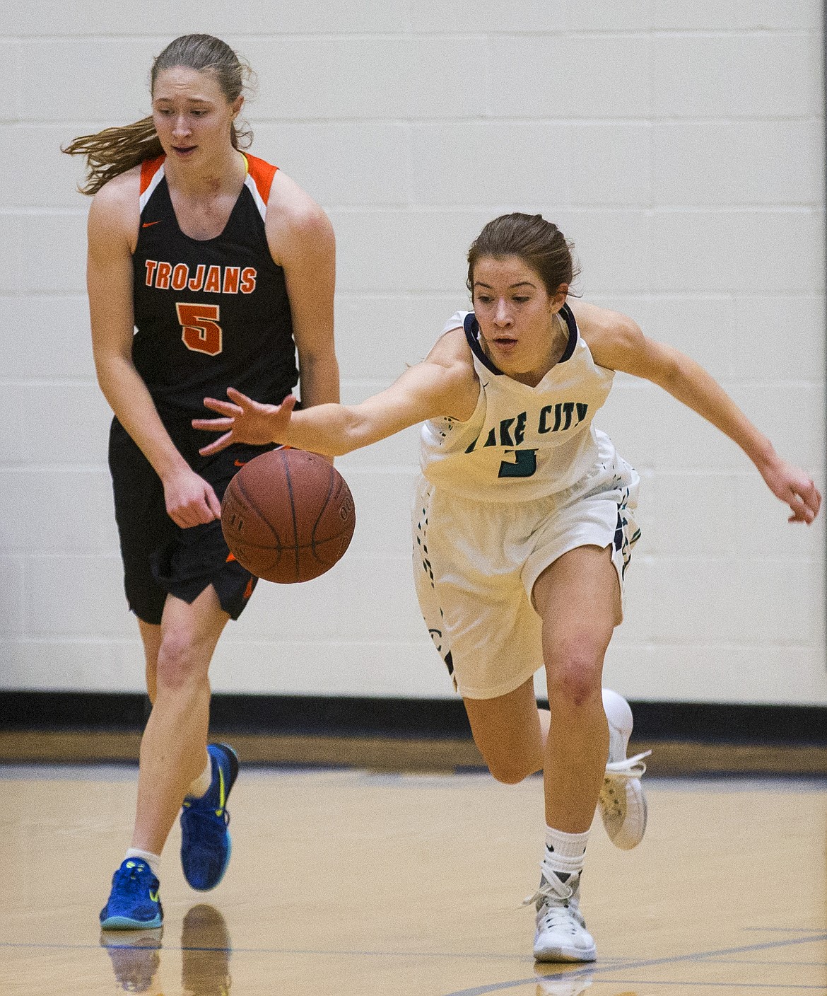 LOREN BENOIT/Press

Nina Carlson, right, steals the ball away from MacKenzie Morris during Thursday&#146;s game at Lake City High School.