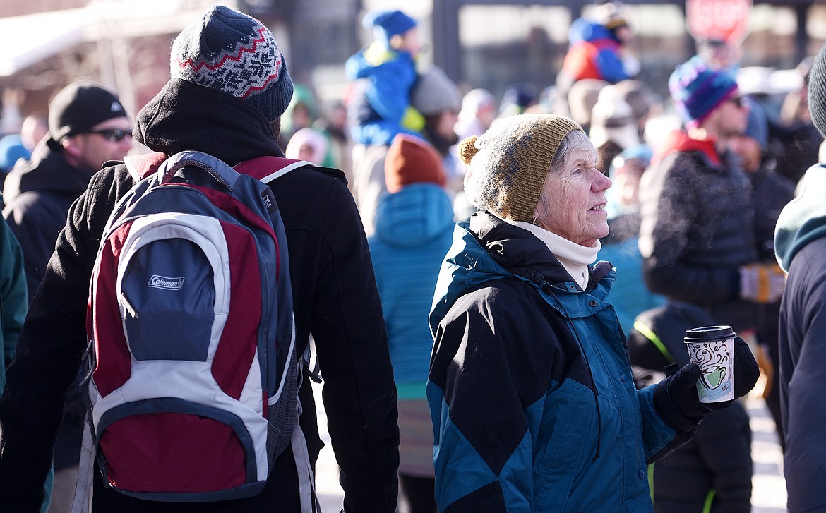Kathy Shigo of Whitefish gathering with the crowd for the Love Not Hate event in downtown Whitefish on Saturday, January 7.(Brenda Ahearn/Daily Inter Lake)