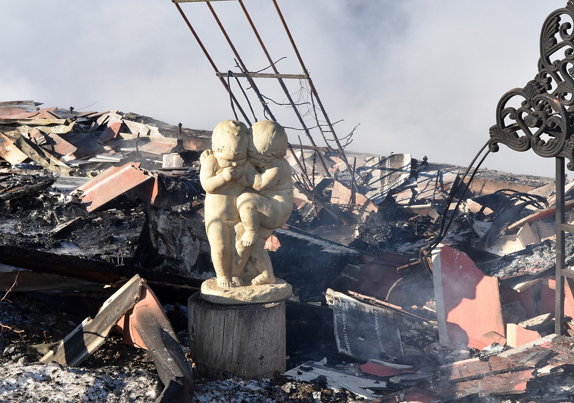 This sculpture was part of the very few items that remained intact at a North Pinnacle Road home that was destroyed by fire Tuesday night. (Heidi Desch / Whitefish Pilot)
