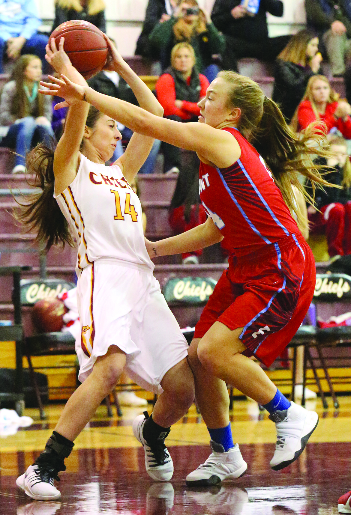 Connor Vanderweyst/Columbia Basin Herald
Moses Lake's Maggie Strom tries to protect the ball against Eastmont.