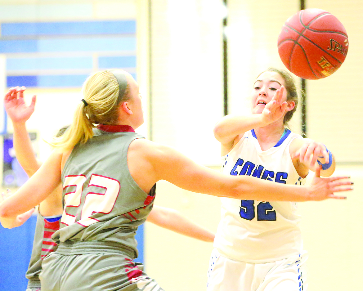 Connor Vanderweyst/Columbia Basin Herald
Warden guard Cassidy Turner's pass is deflected out of bounds by Okanogan's Jordyn Boesel (22).