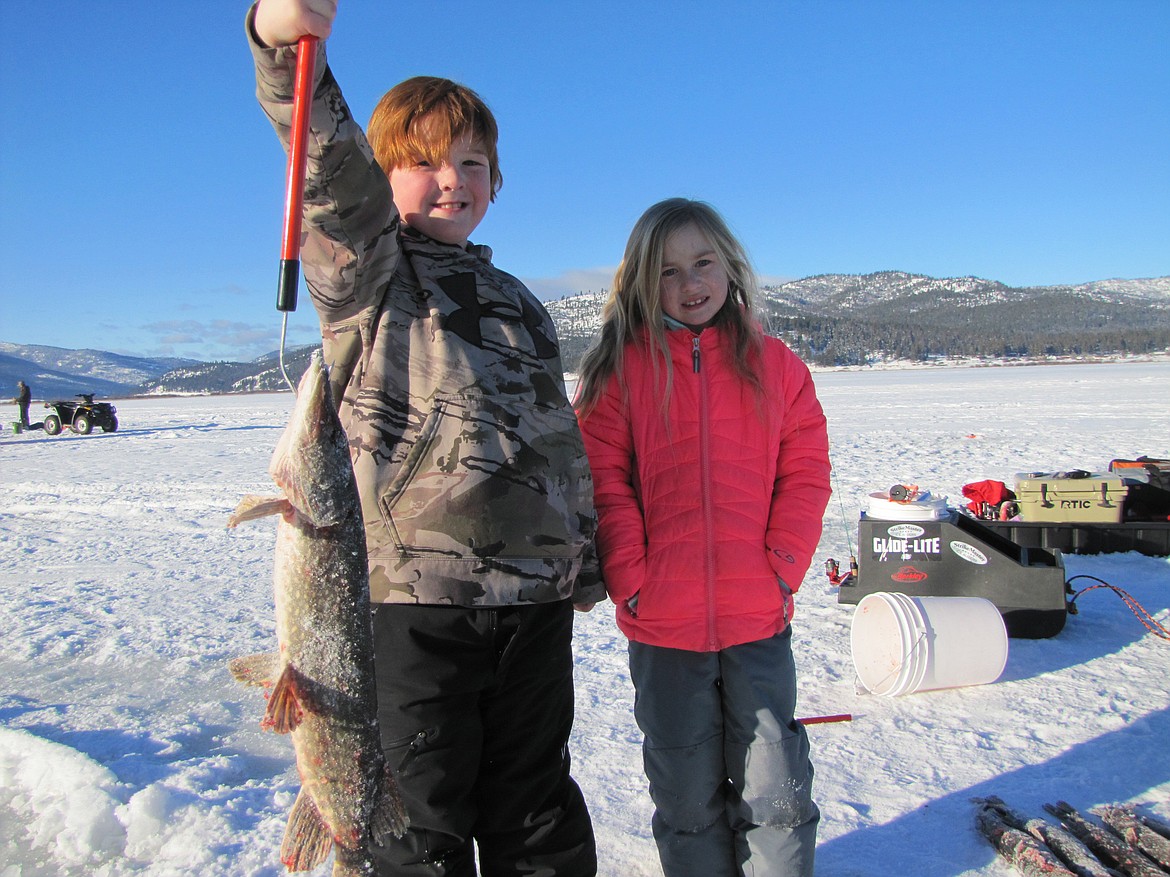 Dane Reynolds, a fourth-grader in the Edgerton School Hooked on Fishing Program, caught the largest pike of the day, a 2.84-pounder. (Photo courtesy of Montana Fish, Wildlife and Parks)&#160;