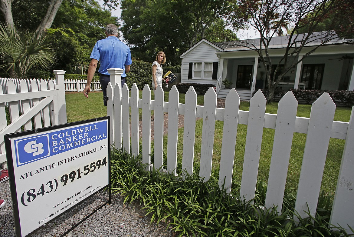 AP Photo/Chuck Burton
Real estate agent Lauren Newman prepares to show Steve Martin a home for sale in Mount Pleasant, S.C., just over the bridge from historic Charleston on April 20, 2016. If you&#146;re about to buy a home, shop for a car or borrow for college, the pros have some advice: Go ahead. The Fed&#146;s move to slightly raise its key rate should have little effect on mortgages or auto and student loans.