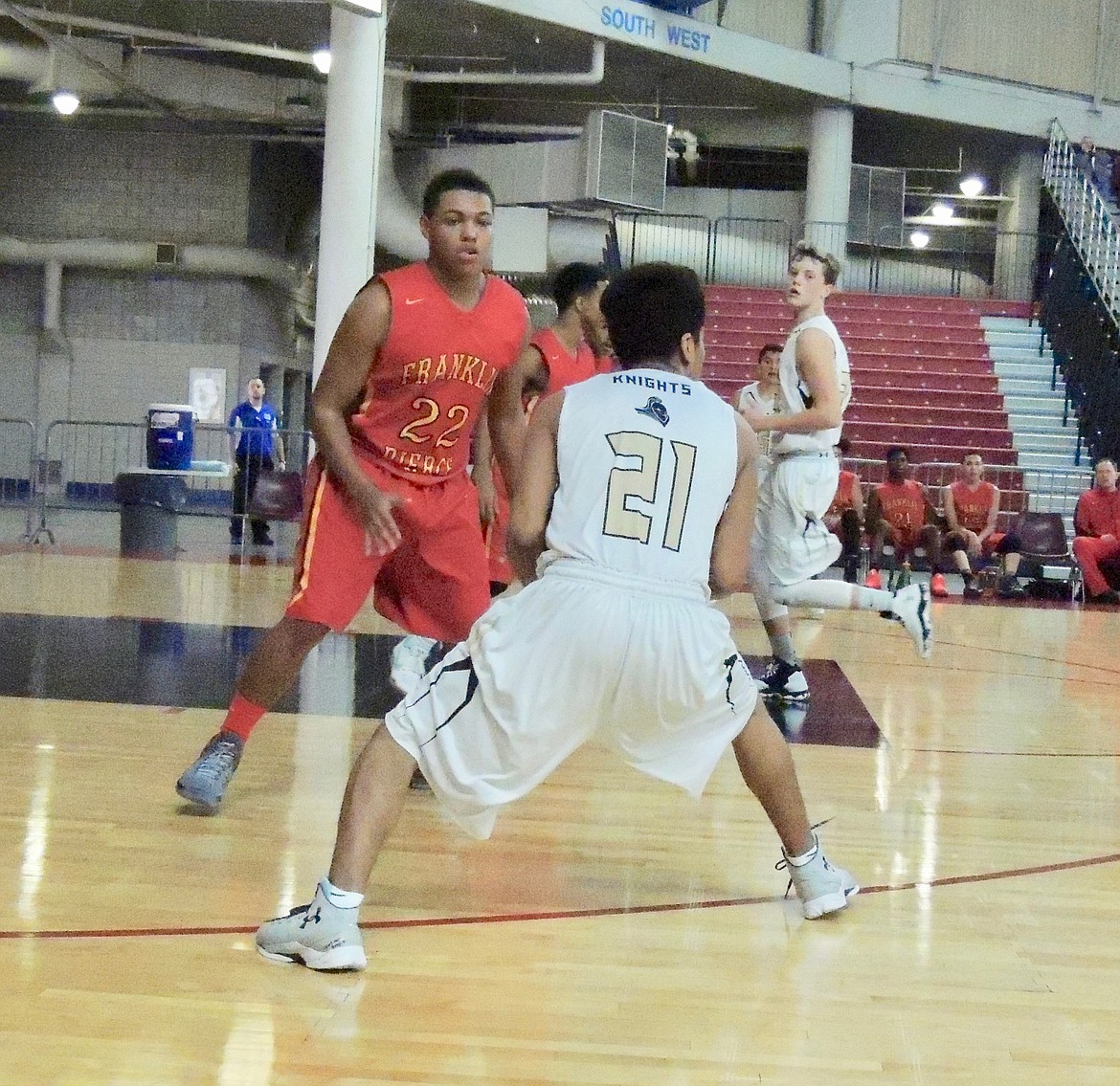 Ted Escobar/The Sun Tribune - Osiel Ramirez prepares to pass the ball to a teammate against Franklin-Pierce.