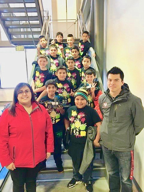 Ted Escobar/The Sun Tribune - The Saddle Mountain Elementary VEX Robotics club members pictured from left to right: 6th row - Albaro Gonzalez, Carlo Ramirez, Julian Paramo, Oscar Martinez, 5th row - Edgar Rangel, Brian Herrera, 4th row - Anthony Brown, Sergio Leon, Omar Ramirez. 3rd row - Jose Chavez, Alex Medrano. 2nd row - Alessandro MAravilla, Christopher Martinez. from row: Katie Ruiz, Cesar Ortiz (coach)