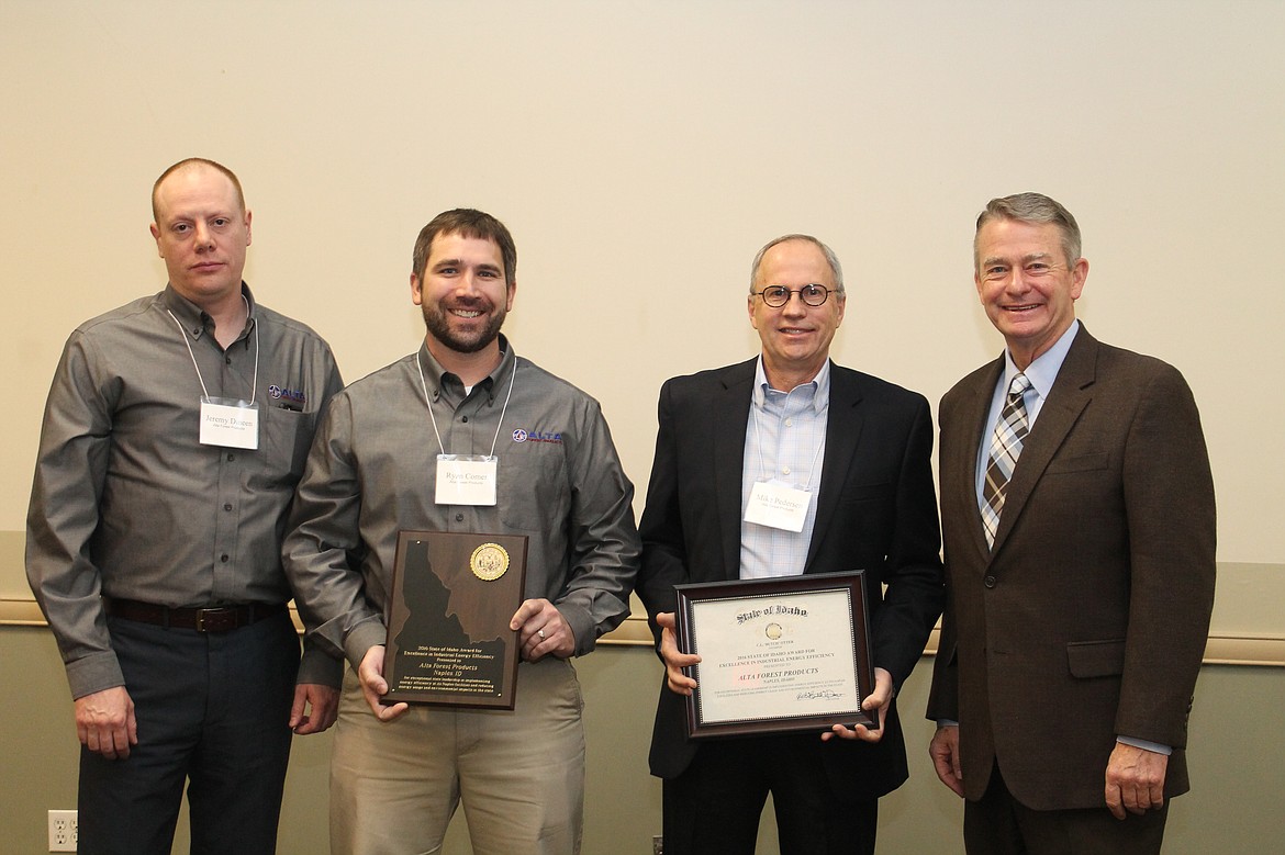 &#151;Courtesy photo
Lt. Governor Brad Little, far right, presents the 2016 Energy Efficiency Award to Alta Forest Products, Naples Mill on Nov. 1, in Boise. From left, HR/Safety Manager Jeremy Dineen, Naples Operations Manager Ryan Comer and Alta CEO Mike Pedersen.