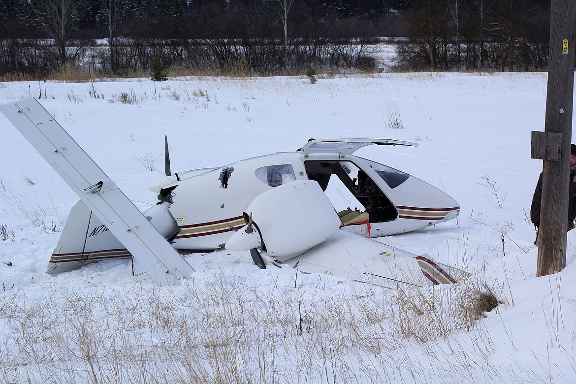 A small twin propeller airplane crashed Tuesday, Jan. 3, at about 9:15 a.m. approximately 200 yards behind the Montana Rail Link railroad in Paradise. (Douglas WIlks/Clark Fork Valley Press)