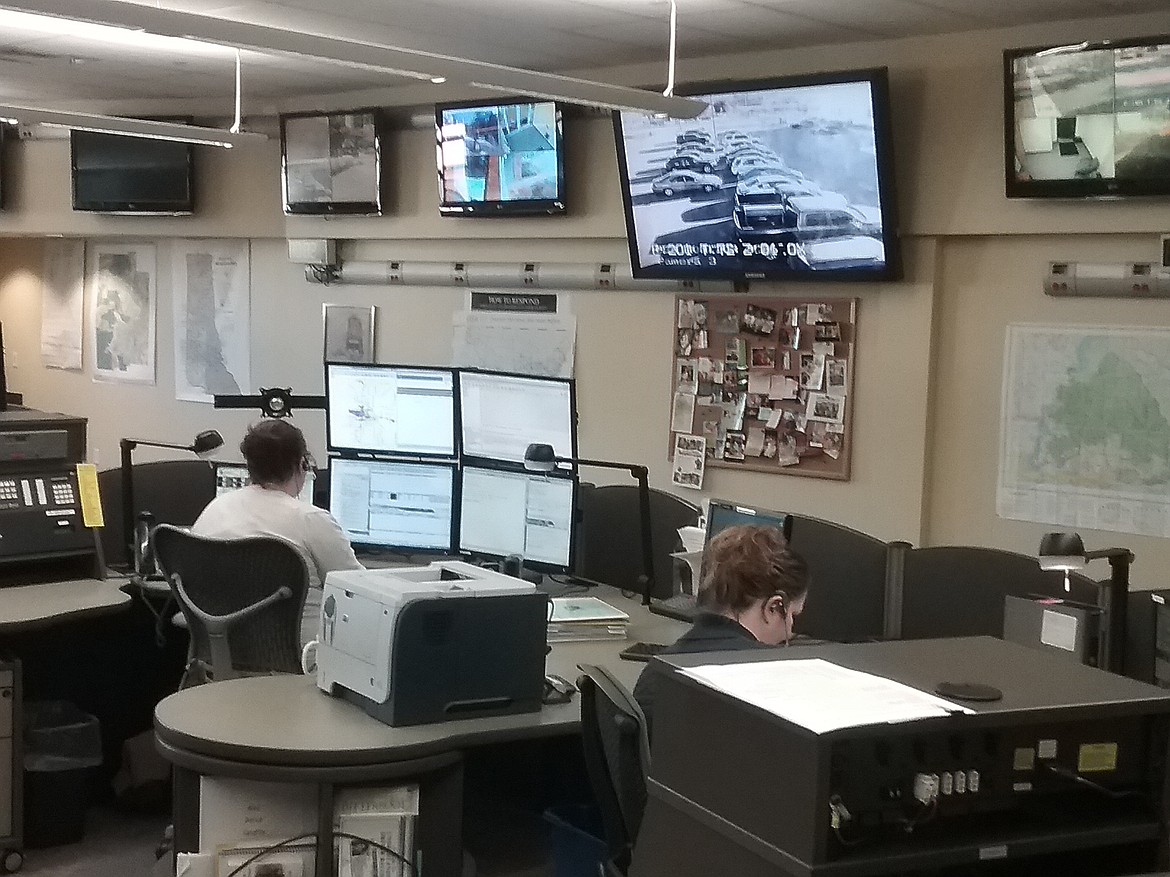 RYAN COLLINGWOOD/Press
Idaho State Police dispatchers take calls Thursday at the Linda Huff ISP Region One Building.