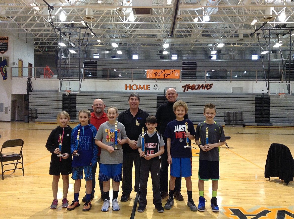 Courtesy photo
Top-three placers in the 10-11 year-old age group for the 2017 Coeur d&#146;Alene Elks Hoop Shoot are, front row from left, girls third-place finisher Violet Andrews, second place Lauren Bengtson and champion Kamryn Pickford, boys champion Steven Anderson, second place Deacon Kiesbuy and third place Isaac Ziegler; and back row from left, Coeur d&#146;Alene Hoop Shoot Director Rick Alexander, Idaho Elks President Steve Meier and Coeur d&#146;Alene Elks President Jerry Adamson.