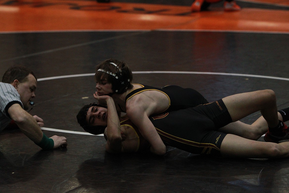 MARK NELKE/Press
Sam Edelblute of Lakeland drives Kadin Wheeler of Columbia to the mat at 106 pounds in a semifinal dual at the River City Duals on Saturday at Post Falls High. Edelblute won by pin in 1:02.