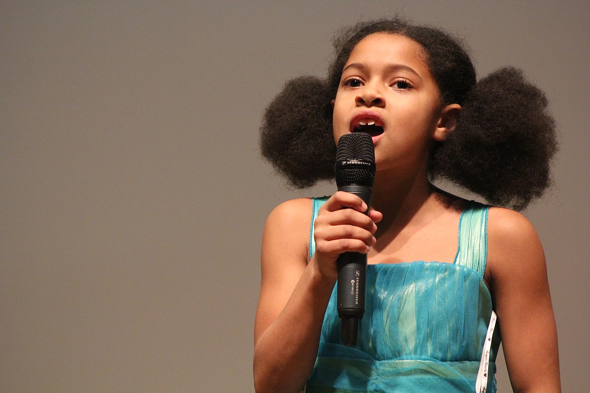 Richard Byrd/Columbia Basin Herald
Glory Jones hits a high note while singing during Monday night&#146;s program.