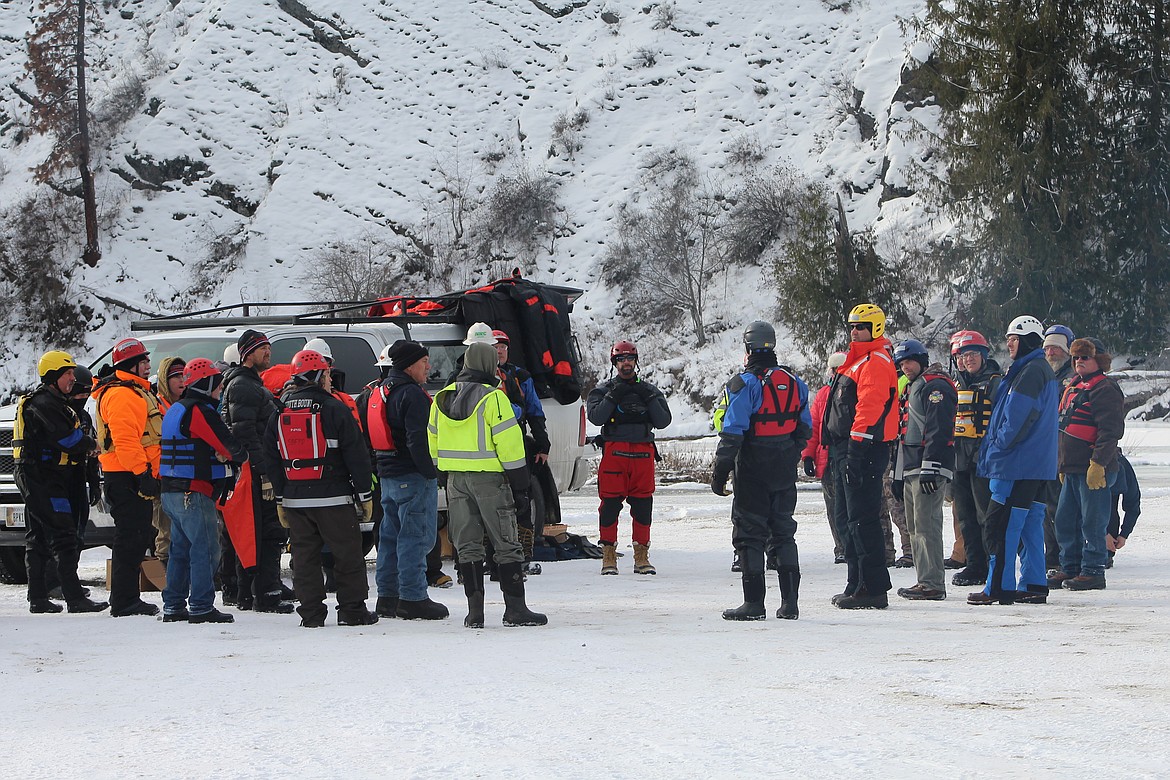 Photo by STAR SILVA
First responders from the Boundary County Sheriff&#146;s Office, Boundary County Emergency Management, Boundary Search &amp; Dive Rescue Team, Kootenai Tribe of Idaho Police Department, North Bench Fire District, South Boundary Fire Protection District, Boundary Ambulance, and Idaho Department of Environmental Quality gather on Saturday at the confluence of the Kootenai and Moyie rivers for Hazmat oil spill training by Burlington Northern Santa Fe, BNSF contractors Whitewater Rescue Institute and Kennedy Jenks, who partnered with the Kootenai Tribe of Idaho to provide the all-day training session.