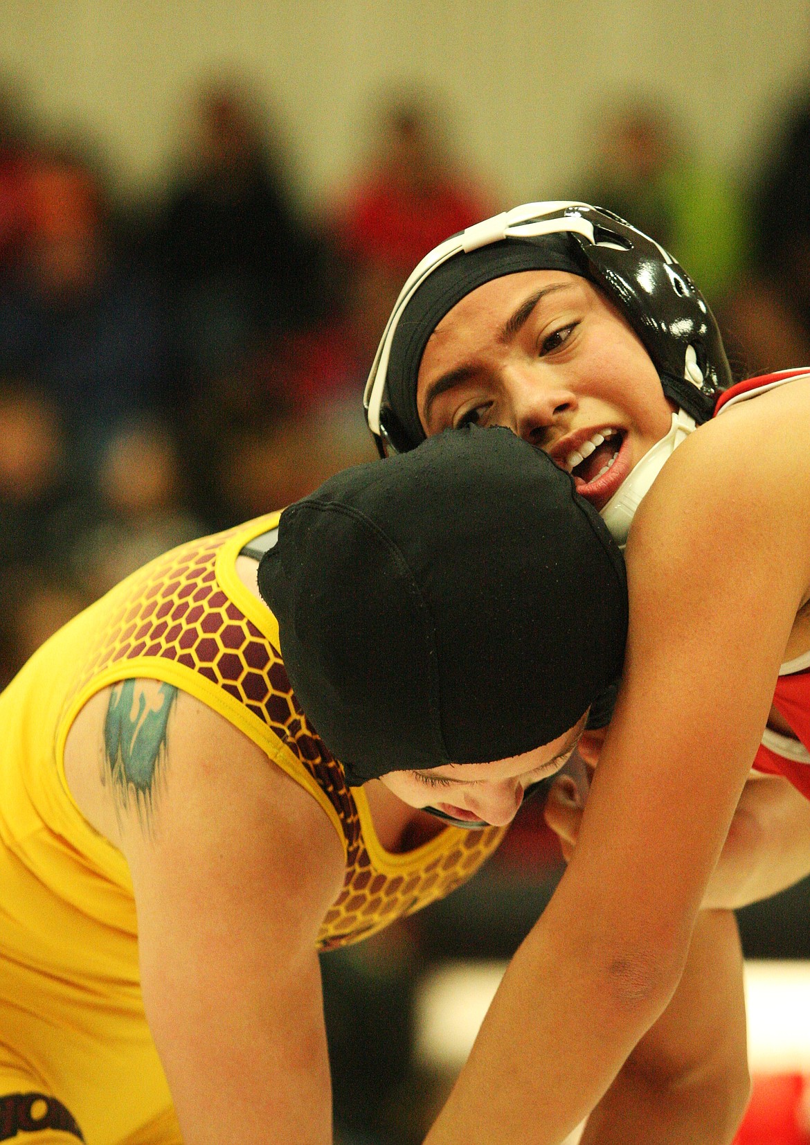 Rodney Harwood/Columbia Basin Herald
Nikki Velazquez of Othello lost to Erin Redford of White River in the 130-pound championship match Saturday at the Lady Huskies Invitational in Othello.