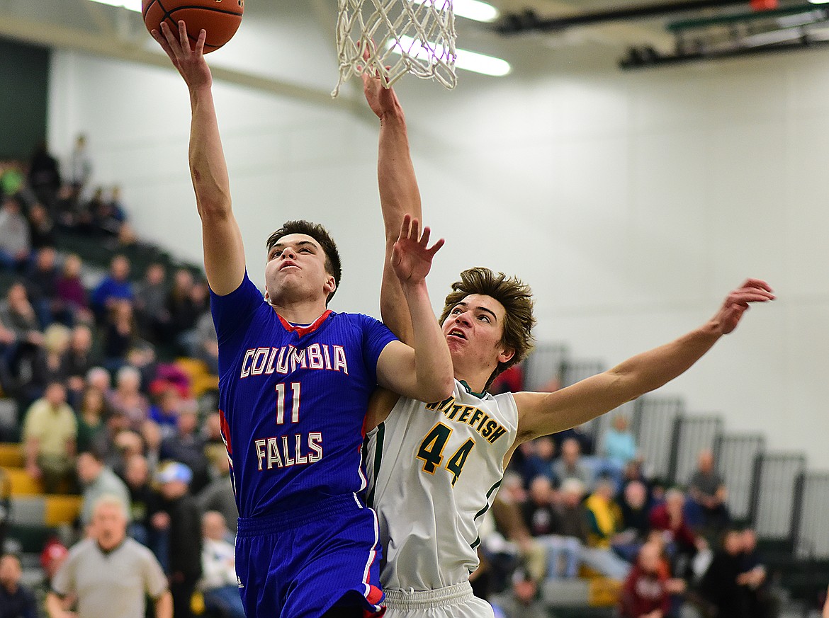 Logan Stephens drives to the basket against the Bulldogs.