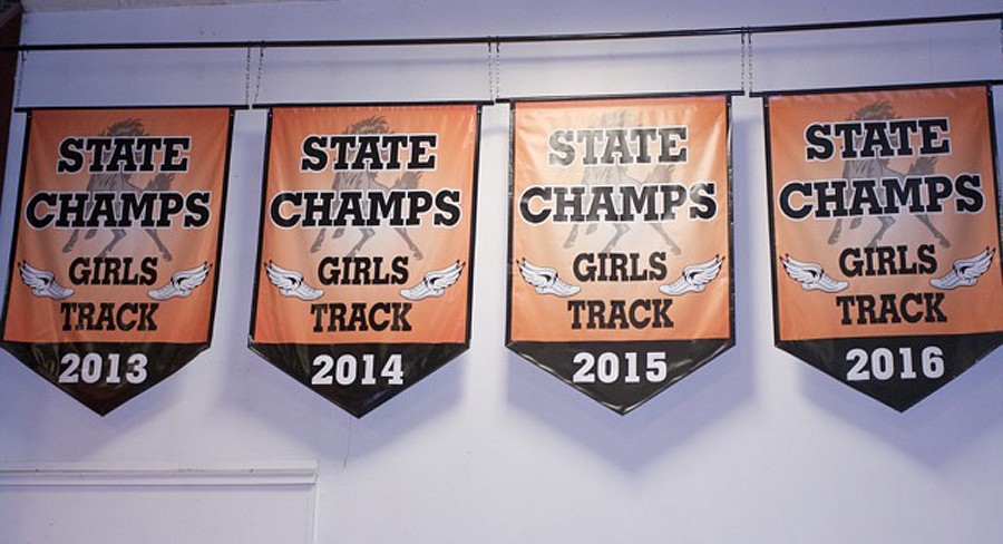 A BANNER celebrating the Plains track and field teams&#146; fourth straight state championship was raised on Saturday. (Douglas Wilks/Clark Fork Valley Press)