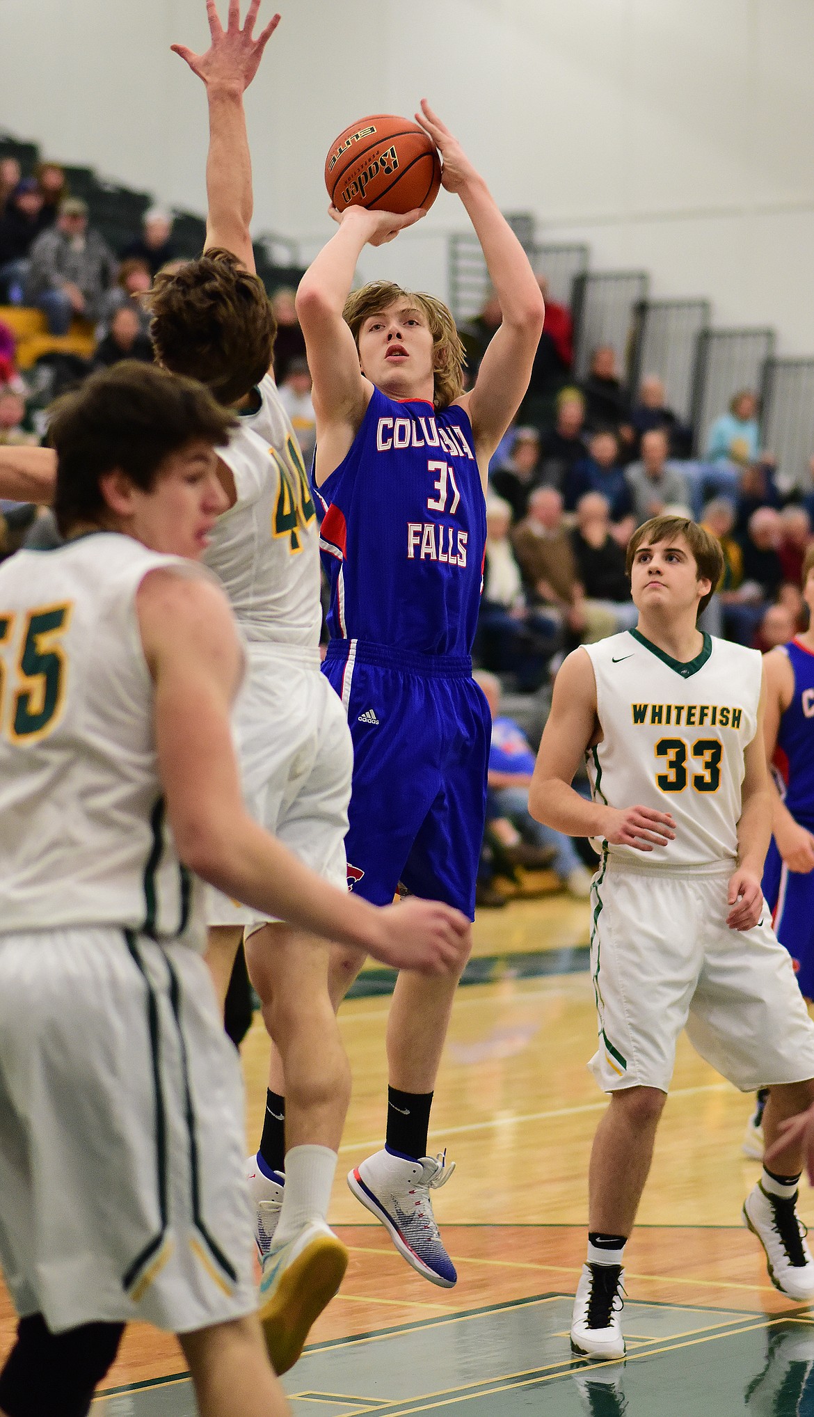 Matt Morrison with a jumper over the Bulldogs.