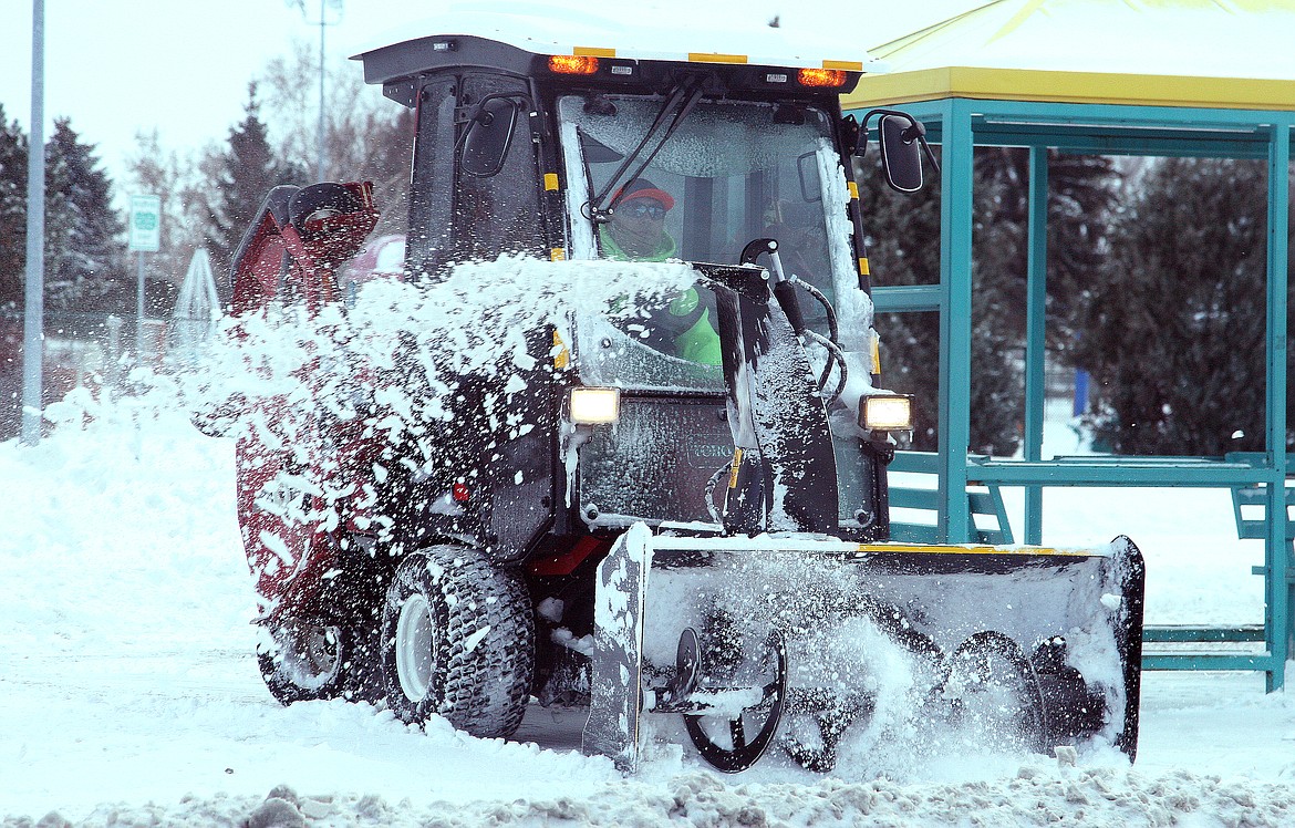 Rodney Harwood/Columbia Basin Herald
Snow removal crews were out all over Moses Lake on Tuesday, digging out from the latest winter blast to come through. Temperatures are expected to drop to below zero and then warm up by next week.