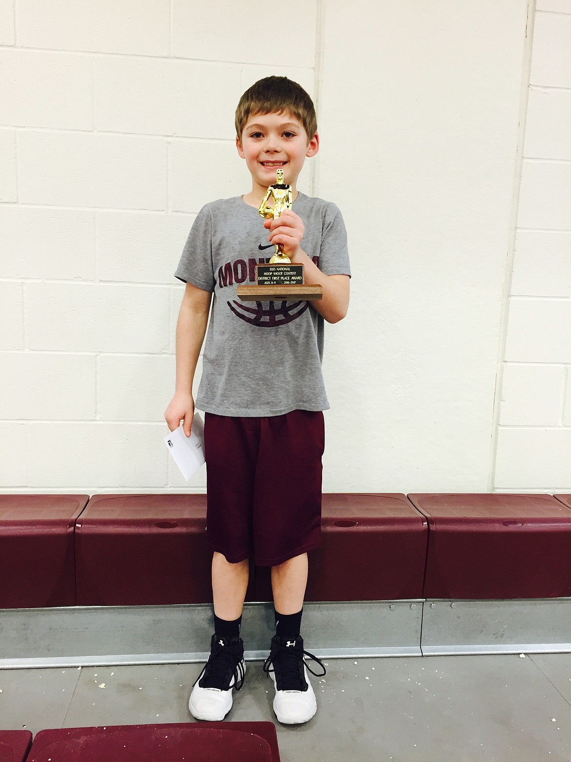 Carson Toivonen, 8, of Superior, won the District Hoop Shoot Free Throw Championship on Saturday. He will go to state competition in February. (Photo courtesy of Chris Toivonen).