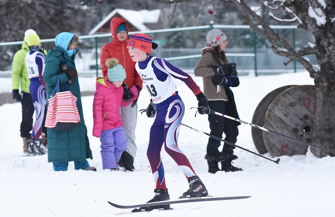 Nate Ingelfinger turns the final corner on the 3K skate race during the Glacier Glide on Sunday.