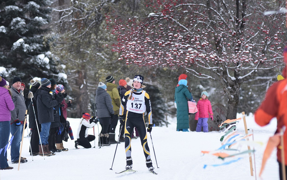 Terra Bertsch finishes the 3K skate ski race during the Glacier Nordic Club&#146;s Glacier Glide on Sunday at Whitefish Lake Golf Club. (Daniel McKay / Whitefish Pilot)