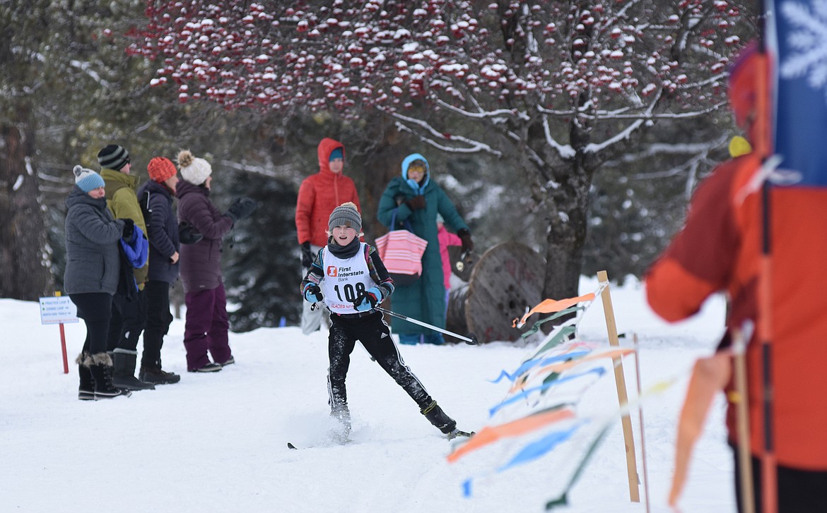 Isabelle Cooke glides to the end of the 3K skate ski race during the Glacier Glide on Sunday.