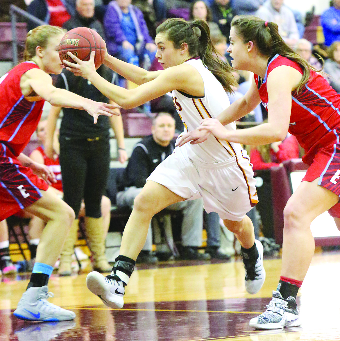 Connor Vanderweyst/Columbia Basin Herald
Jamie Loera drives to the basket against Eastmont.