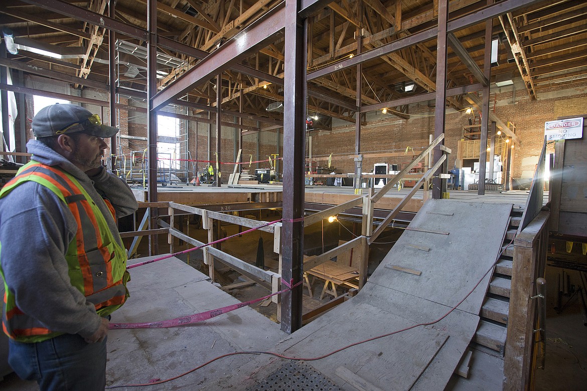 Photos: LISA JAMES/Press
Ginno Construction supervisor Mike Sowl looks into the main floor from the entrance of the old Elks building as construction continues on Jan. 20. Led by Nick Smoot, the old Elks building, on Fifth Street and Lakeside Avenue in downtown Coeur d&#146;Alene, will soon become the Innovation Den, a space for companies to rent small and large offices. It will also be headquarters of Innovation Collective, and a public coffee house with additional event space for conferences and large meetings that contribute to the mission of an innovation economy.