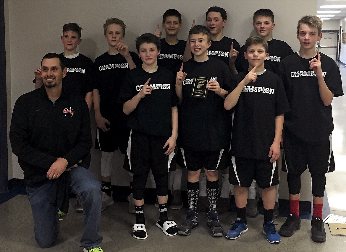 Courtesy photo
The Rebels seventh-grade AAU boys basketball team took first place last weekend at the Snake River Shootout in Lewiston. In the front row from left are coach Felix McGowan, Jack Sciortino, Cole Cooper, Caleb Schroeder and Devyn Ivankovich; and back row from left, Tyson Rutherford, Jaxon Anderson, Kale McGowan, Nick Chase and Chase Berg. Not pictured is coach Paul Schroeder.