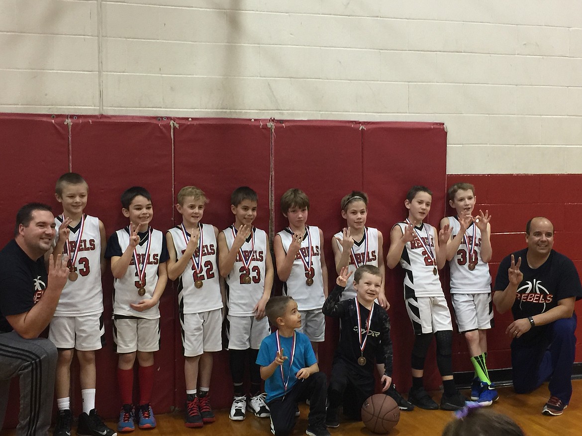 Courtesy photo
The Rebels third-grade AAU boys basketball team placed third in the fourth-grade division at the Snake River Shootout in Lewiston last weekend. In the bottom row are ball boys; and top row from left, coach Tyler Smith, Conner Carver, Cashton Bodman, Jaxon Lysne, Isaiah Naylor, Elliot Ries, Rylan Brandt, Jace Ostlund, Jaden Smith and coach Mike Naylor. Not pictured is coach Shaun Leary.