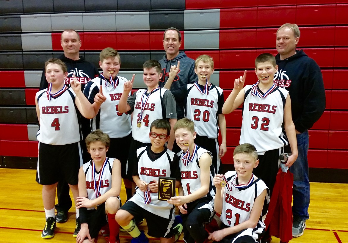 Courtesy photo
The Rebels sixth-grade boys AAU basketball team went 5-0 to win the championship at the Snake River Shootout in Lewiston last weekend. In the front row from left are Coalby Calkins, Zach Engelson, Gabriel Cooley and Ben Auble; second row from left, Caden Marmon, Andrew Kammarcal, Aidan Kammarcal, Jack Boettcher and Jayden Butler; and back row from left, coach Duster Butler, coach Wade Engelson and coach Wayne Boettcher.