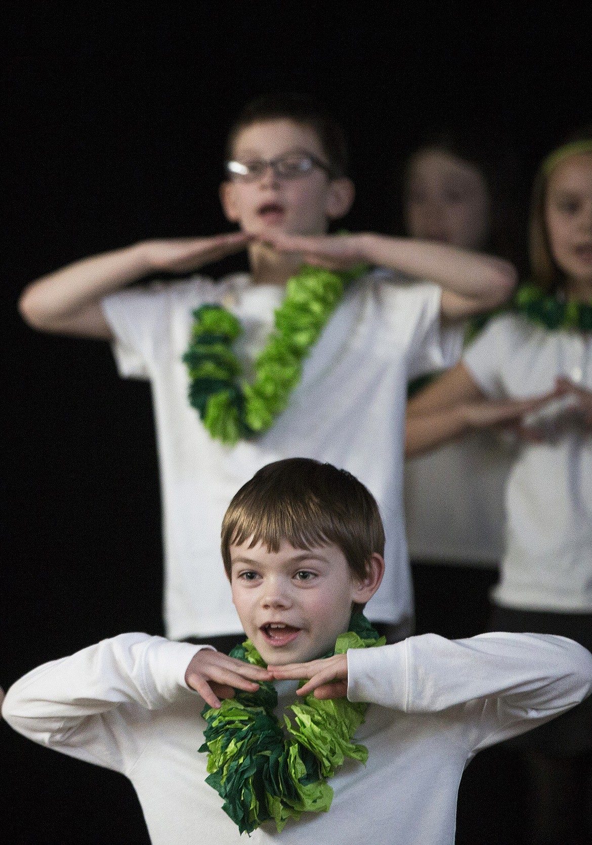 LISA JAMES/ PressSorensen Elementary School 2nd grader Frankie Pigott takes part with classmates in their turtle themed performance during Aloha Day on Friday. Students performed different types of Hula, incorporating the lessons in history, culture, legend, language and the natural environment of Hawaii that this year's artist-in-residence Bria Zan Thompson brought to the school.