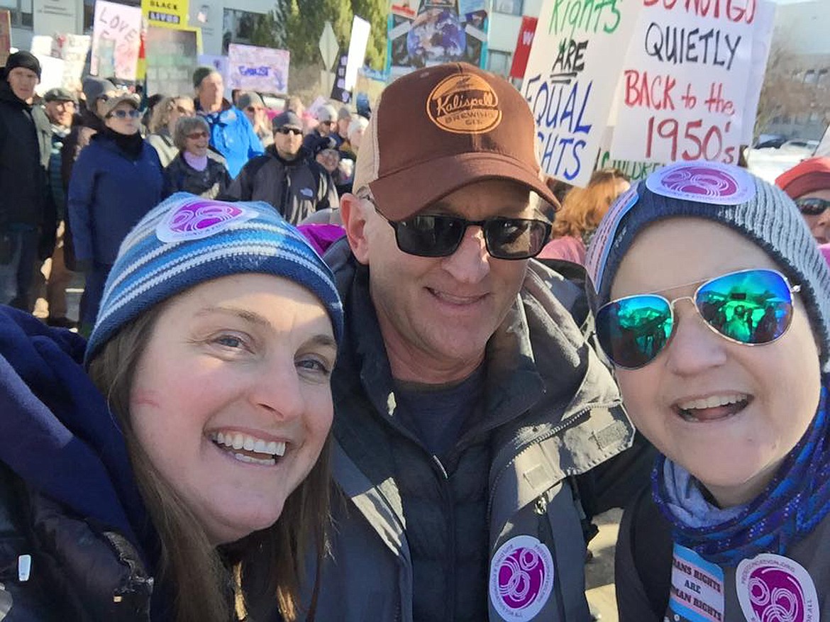 Flathead Valley residents Cherilyn DeVries, Will Randall and Kim Leighton at the Women&#146;s March in Helena on Saturday. (Photo courtesy of Barbara Schelling)