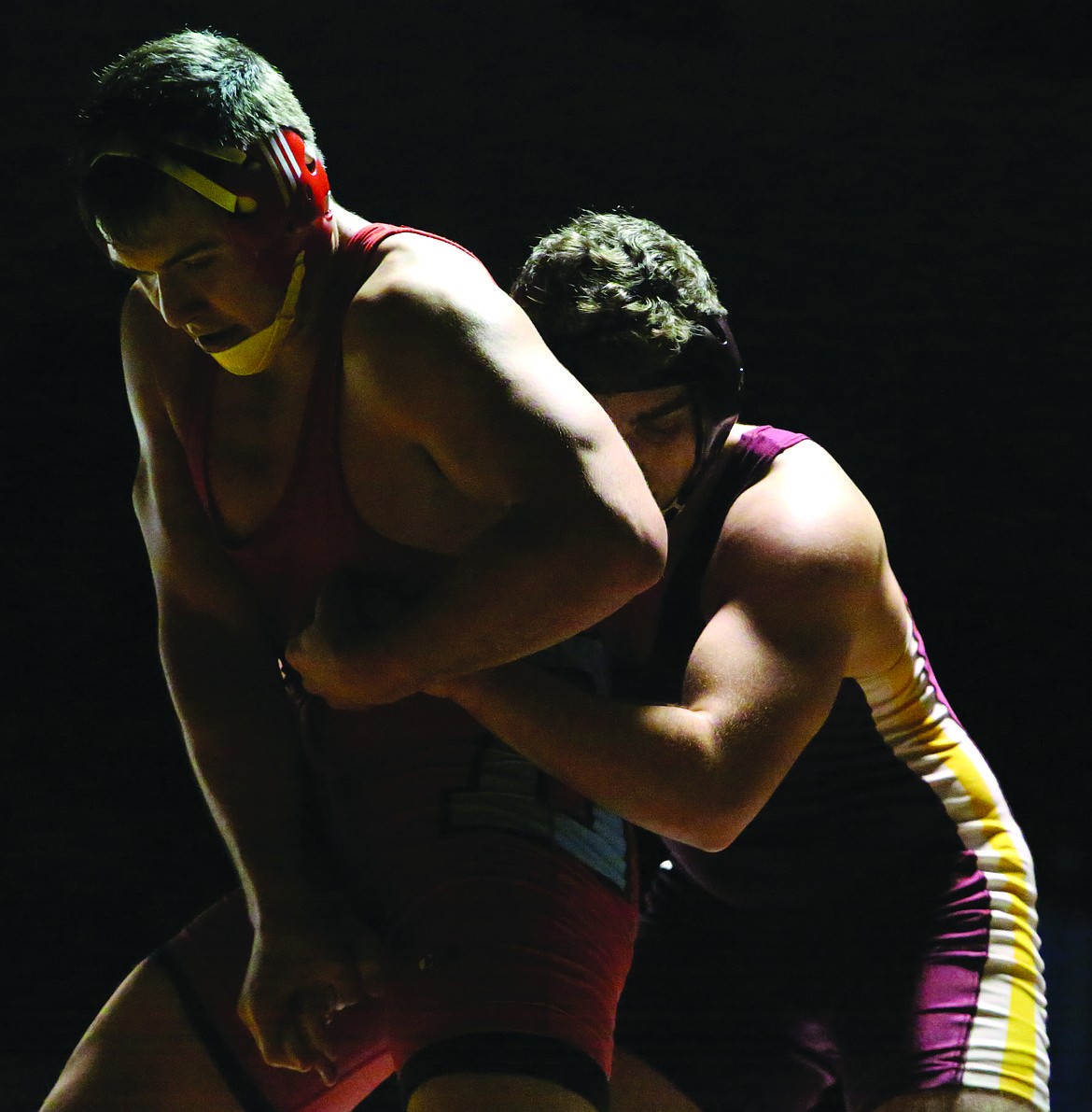 Connor Vanderweyst/Columbia Basin Herald
Daiman Vasquez tries to hang on to Isaiah Johnston of Eastmont.