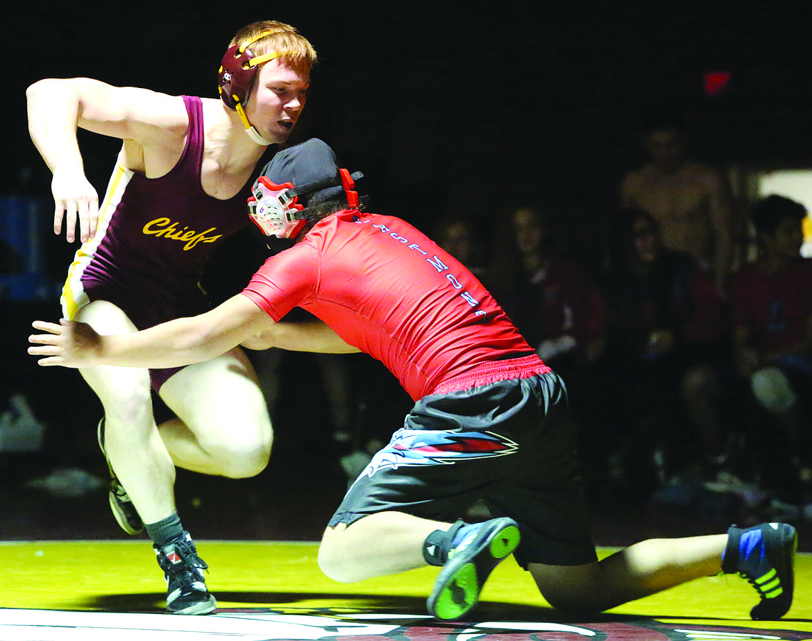 Connor Vanderweyst/Columbia Basin Herald
Moses Lake&#146;s Beau Mauseth dodges a shot from Trey Lopez.