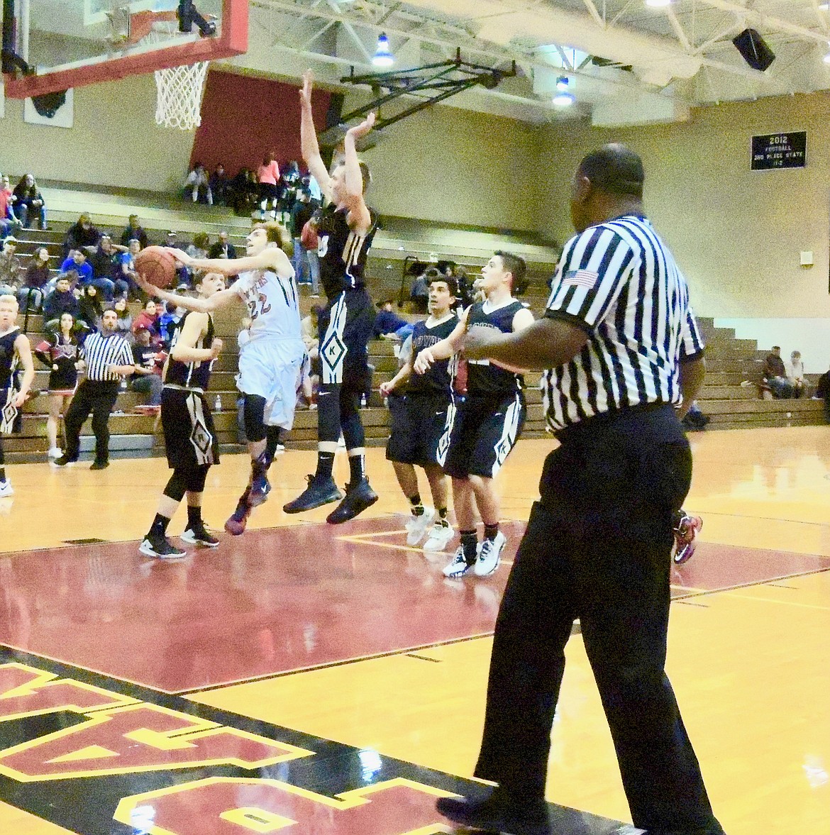 Ted Escobar/The Sun Tribune - Royal&#146;s Corbin Christensen flies high to reject a River View shot.