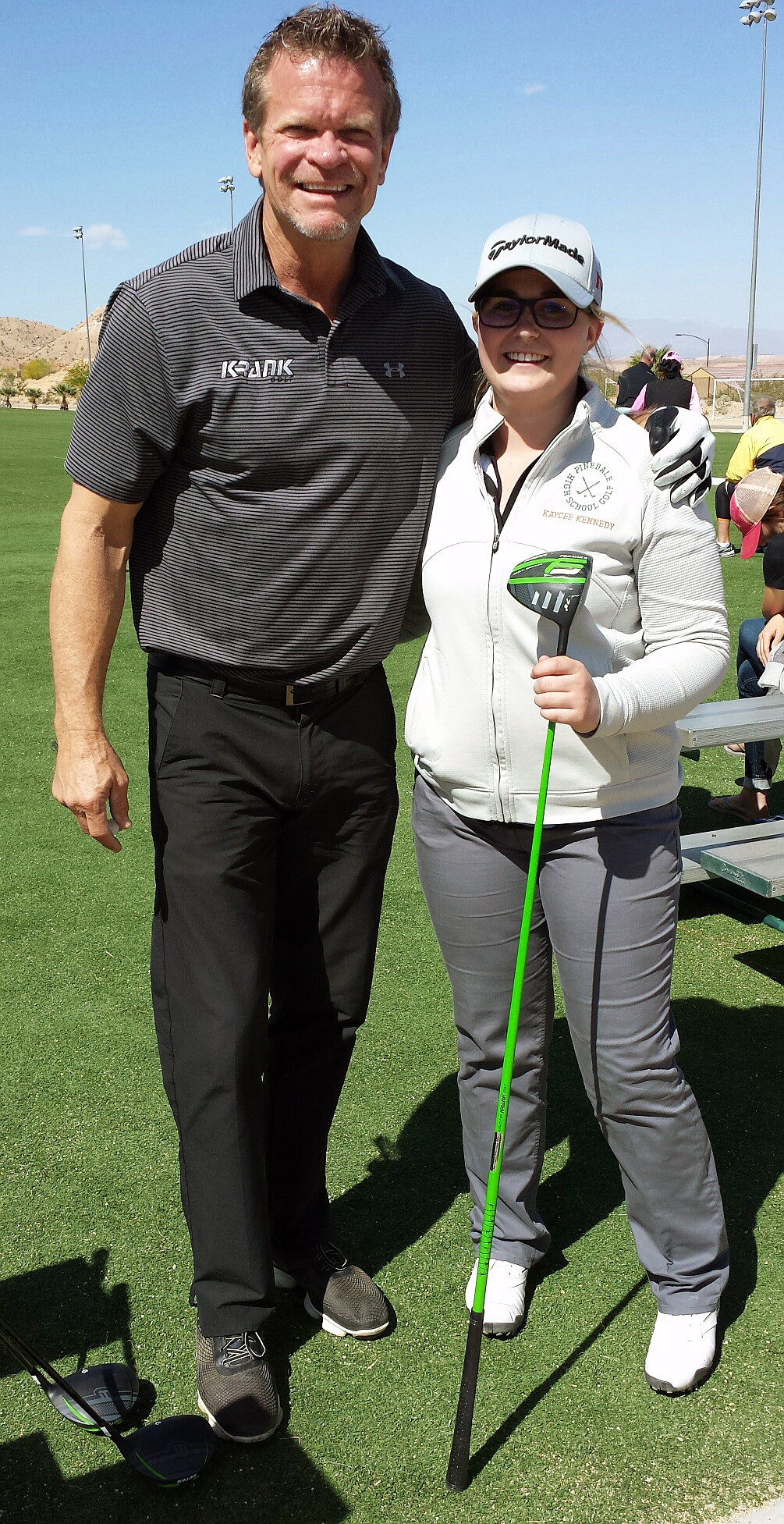 POLSON GOLFER Kaycee Conrad stands next to Krank Golf President Lance Reader. Considered one of the top-15 long drivers in the country, Conrad signed her letter of intent to play with William Penn University in 2016. (Photos courtesty of Katherine Conrad)
