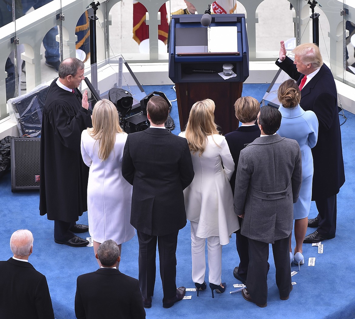 Donald Trump is sworn-in as the 45th president during the Inauguration on Capitol Hill in Washington, Friday, Jan. 20, 2017. (Ricky Carioti/The Washington Post/Pool Photo via AP)