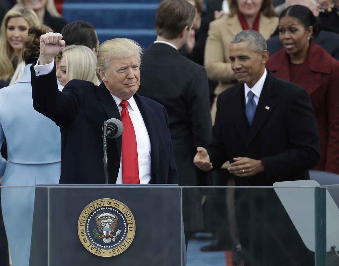 President Donald Trump waves after being sworn in as the 45th president of the United States during the 58th Presidential Inauguration at the U.S. Capitol in Washington, Friday, Jan. 20, 2017. (AP Photo/Patrick Semansky)