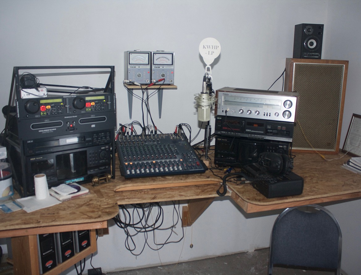The main controls of KWHP-LP; two CD players, each one holding 301 CDs, the microphone and speakers. (Douglas Wilks photos/Clark Fork Valley Press)