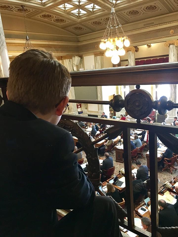 Mineral County Camo Critters 4-H member, Carter Jasper watches the House of Representative vote in Helena on Jan. 17. (Photo by Barb Jasper)