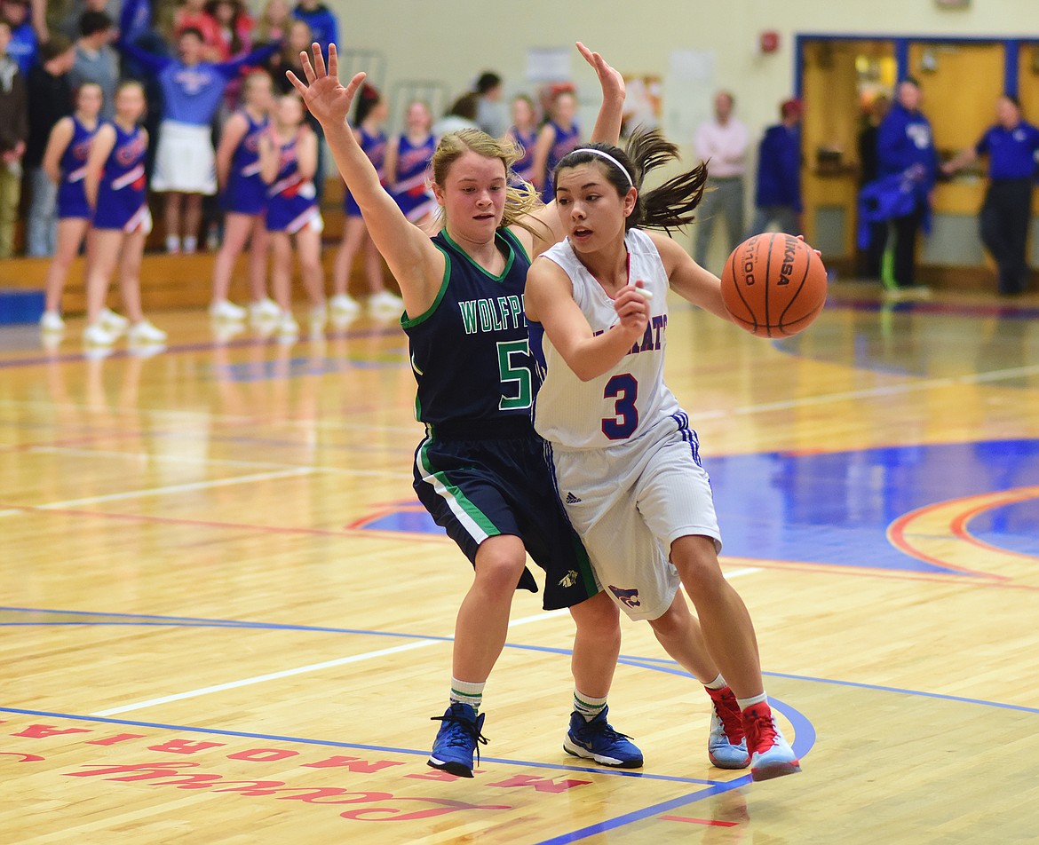 Dani Douglas gets around a Glacier defender.