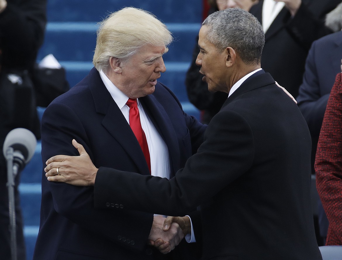 President-elect Donald Trump, left, shakes hands with President Barack Obama before the 58th Presidential Inauguration at the U.S. Capitol in Washington, Friday, Jan. 20, 2017. (AP Photo/Patrick Semansky)