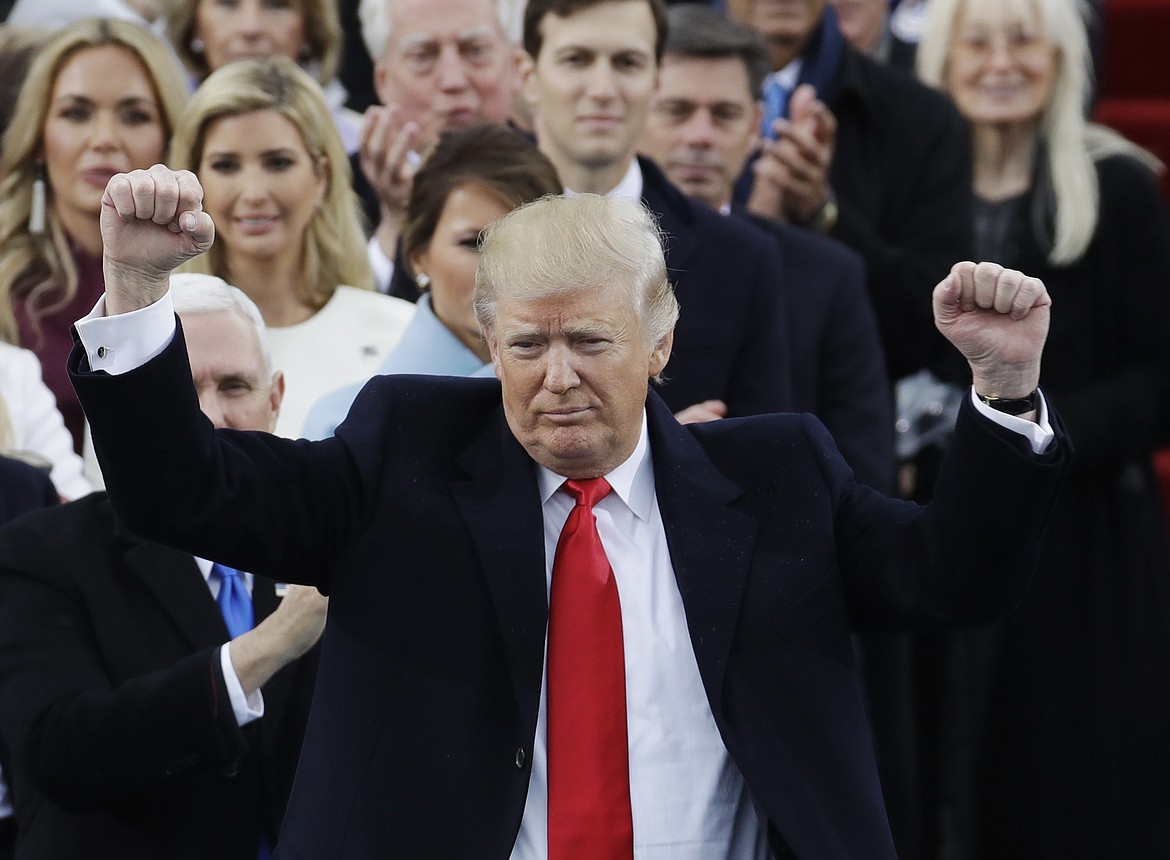 President Donald Trump pumps his fist after delivering his inaugural address after being sworn in as the 45th president of the United States during the 58th Presidential Inauguration at the U.S. Capitol in Washington, Friday, Jan. 20, 2017. (AP Photo/Patrick Semansky)